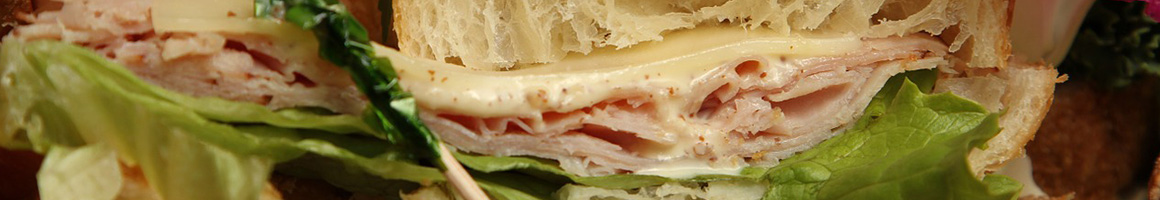 Eating Sandwich at Lamazou restaurant in New York, NY.